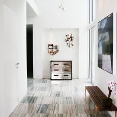 Stone Floors Add Texture in Modern White Foyer