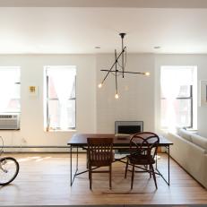 White Modern Dining Room in Open Floor Plan Apartment 