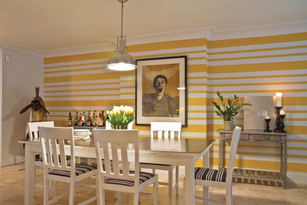 Dining Room With Yellow-Striped Accent Wall, White Dining Table