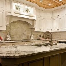 Modern White and Gray Kitchen With Marble Backsplash 
