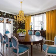 Black Contemporary Dining Room With Yellow Chandelier