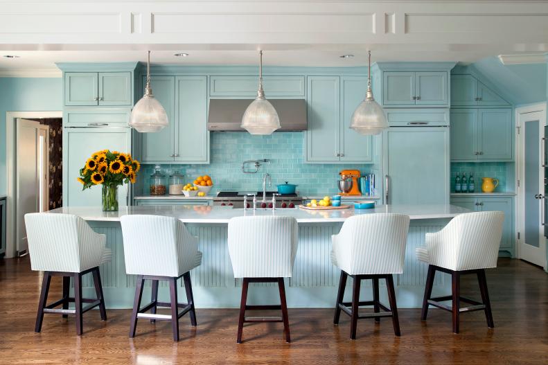 Light Blue Transitional Kitchen With Large Island and Pendant Lights