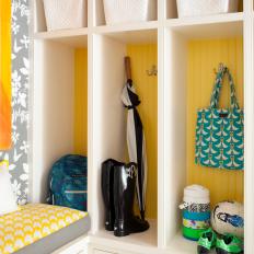 Yellow and White Contemporary Mudroom With Baskets