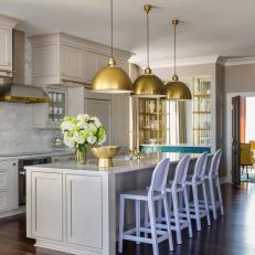 Neutral Transitional Kitchen With Lavender Barstools