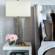 White Nightstand and Silver Lamp