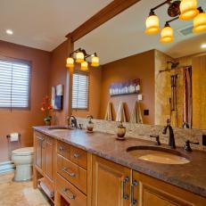 Brown Craftsman Bathroom With Long Double Vanity