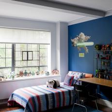 Blue Boy's Bedroom With Striped Comforter and Yoda Wall Sticker 