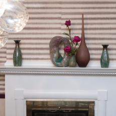 Traditional White Fireplace Paired With Rosy Striped Wallpaper