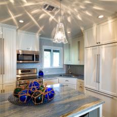 Coastal Kitchen With Glass Pendant Lighting