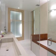 Contemporary Master Bathroom With Wood-Trimmed Bathtub
