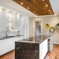 Contemporary White Kitchen With Wood Panel Ceiling Accent