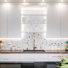 Modern White Kitchen With Black Granite Countertop