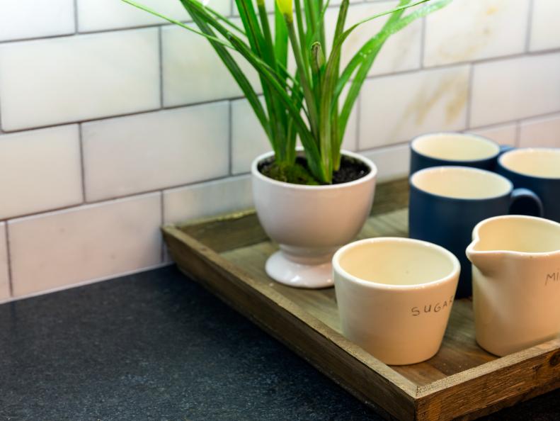 Tray With Coffee Mugs and Potted Plant