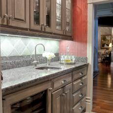 Red and Gray Victorian Kitchen With Wet Bar
