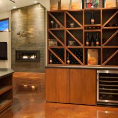 Elegant Wine Cellar With Long Bar and Polished Marble Flooring 