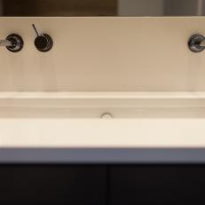 Stainless Steel Fixtures Add Modern Touch to Bath