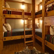Lodge-Style Bunk Room With Rustic Built-In Bunk Beds