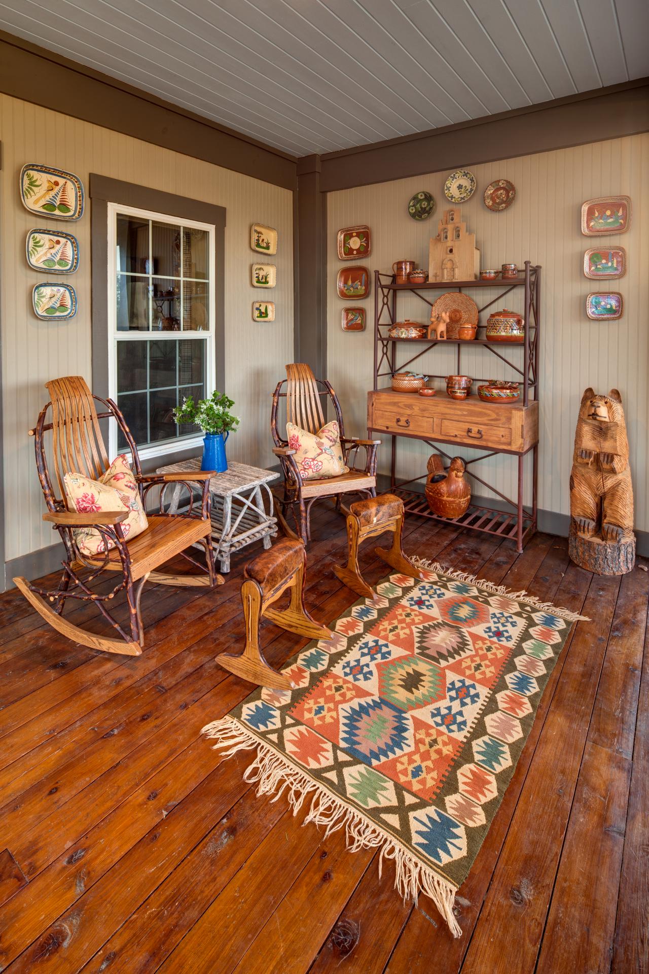Wooden Rocking Chairs Create Cozy Porch Seating Area | HGTV