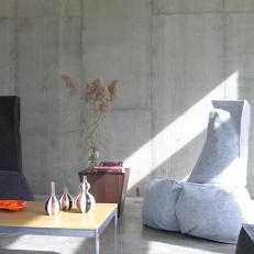 Contemporary Living Space With Cement Walls & Floors