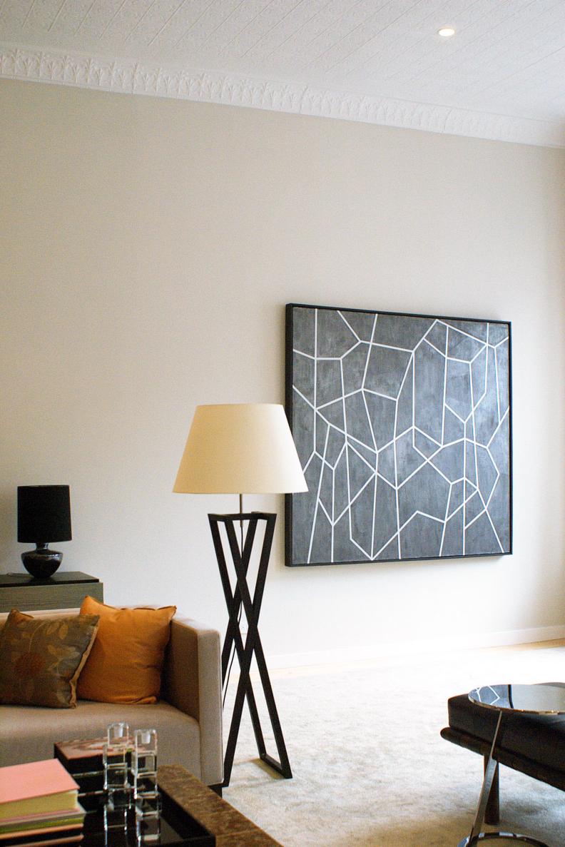 Neutral Living Room With Floor Lamp & Modern Art