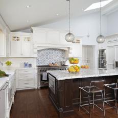 White Kitchen With Blue Accents Feels Bright, Spacious