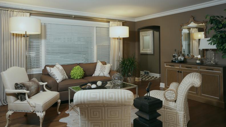 Brown Living Room With Greek Key Chairs & Clear Floor Lamps