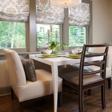 Gray and White Contemporary Dining Area Feels Feminine, Chic