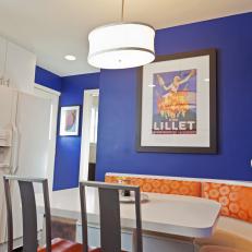White and Blue Kitchen With Orange Banquette