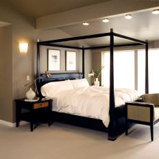 Brown Transitional Bedroom With Black Four-Poster Bed