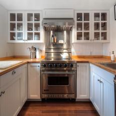White Country Kitchen With Stainless Steel Range