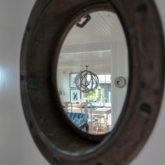 Porthole Window With Dining Room View