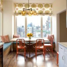 Contemporary Kitchen With Cheery Banquette Dining Area 