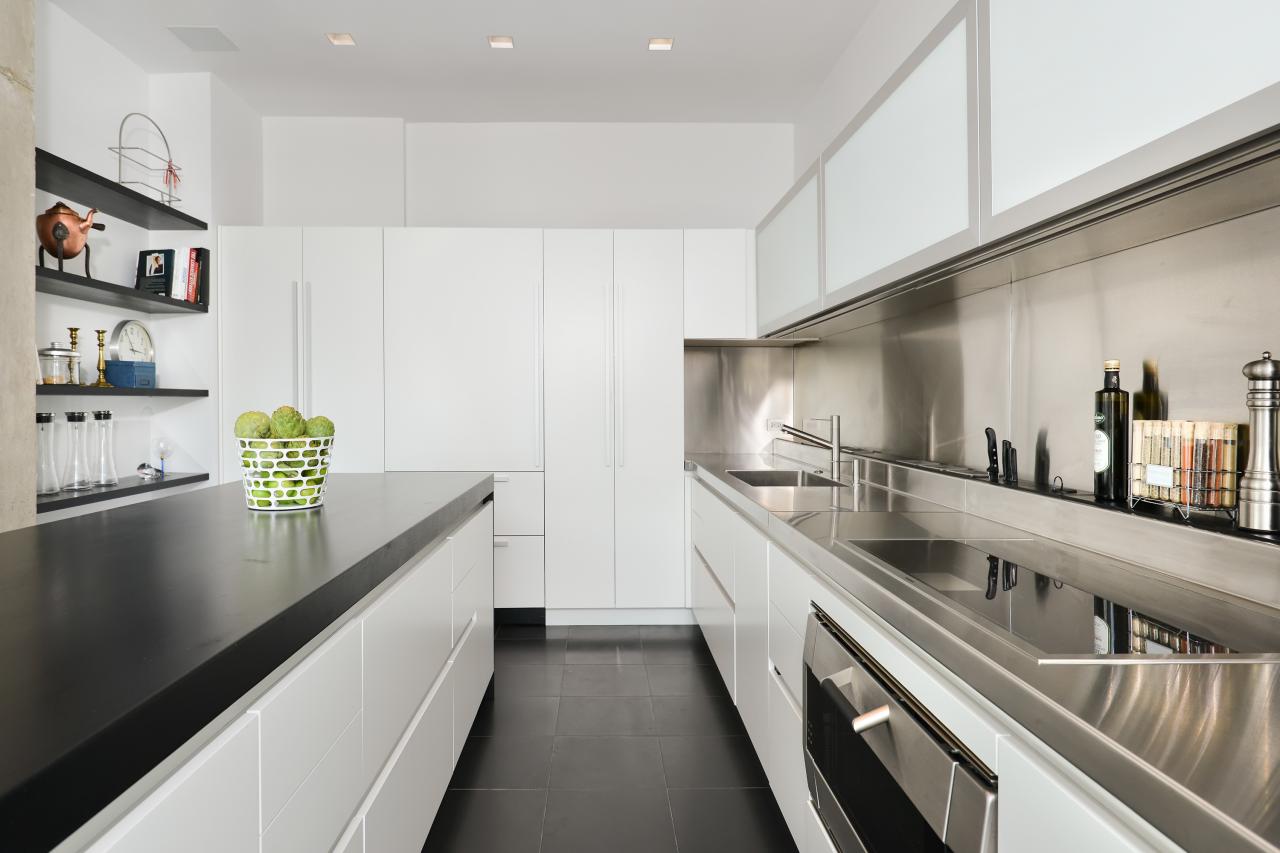 Modern Galley Kitchen With White Matte Lacquered Cabinets | HGTV