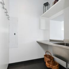 Minimalistic Laundry Room With Storage