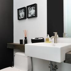 Contemporary Powder Room With Black Accent Wall