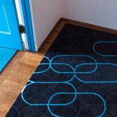 Navy and Cobalt Blue Geometric Rug Adds Youthful Touch
