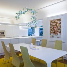 Contemporary White Kitchen With Dining Area Feels Spacious