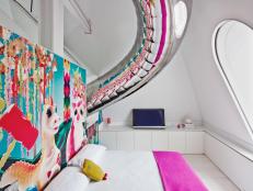 Modern Girl's Bedroom With Colorful Headboard 