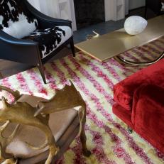 Cowhide Chair and Yellow Striped Rug