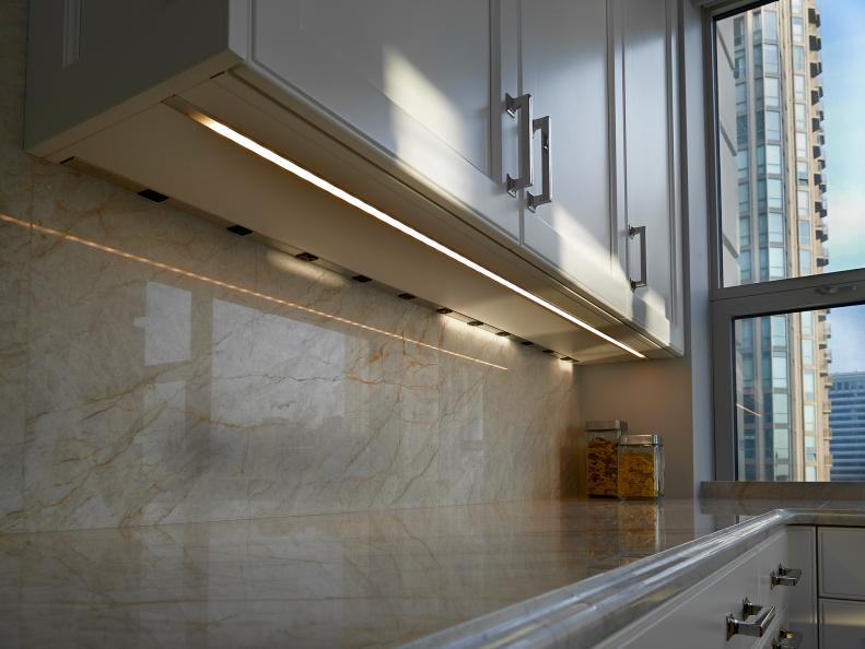 Transitional Kitchen Features Marble Backsplash & Countertop