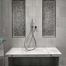 Stunning, Modern Shower Featuring Black & White Tile & Marble