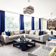 White Contemporary Living Room With Blue Curtains