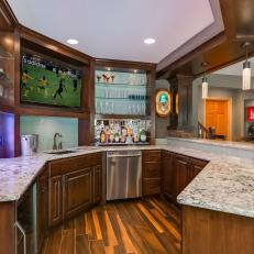 Basement Bar, Ideal for Entertaining, With Television, Handsome Shelving & Marble Countertop 