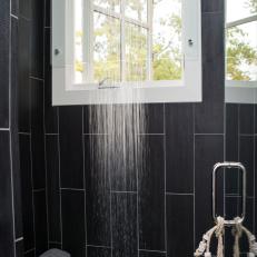 Black Tiled Shower With Pebble Floor