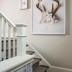 Stairwell With Antler Art