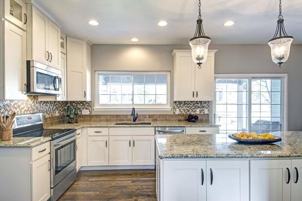 Sophisticated Kitchen Features Soft Tones Marble Countertop