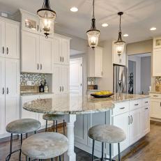 Beautiful Traditional Kitchen Features Soft Colors, Chic Cabinetry & Large Kitchen Island
