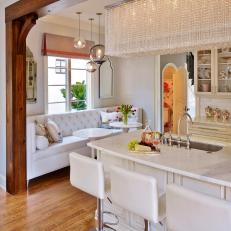 Transitional White Kitchen With Dramatic Chandelier