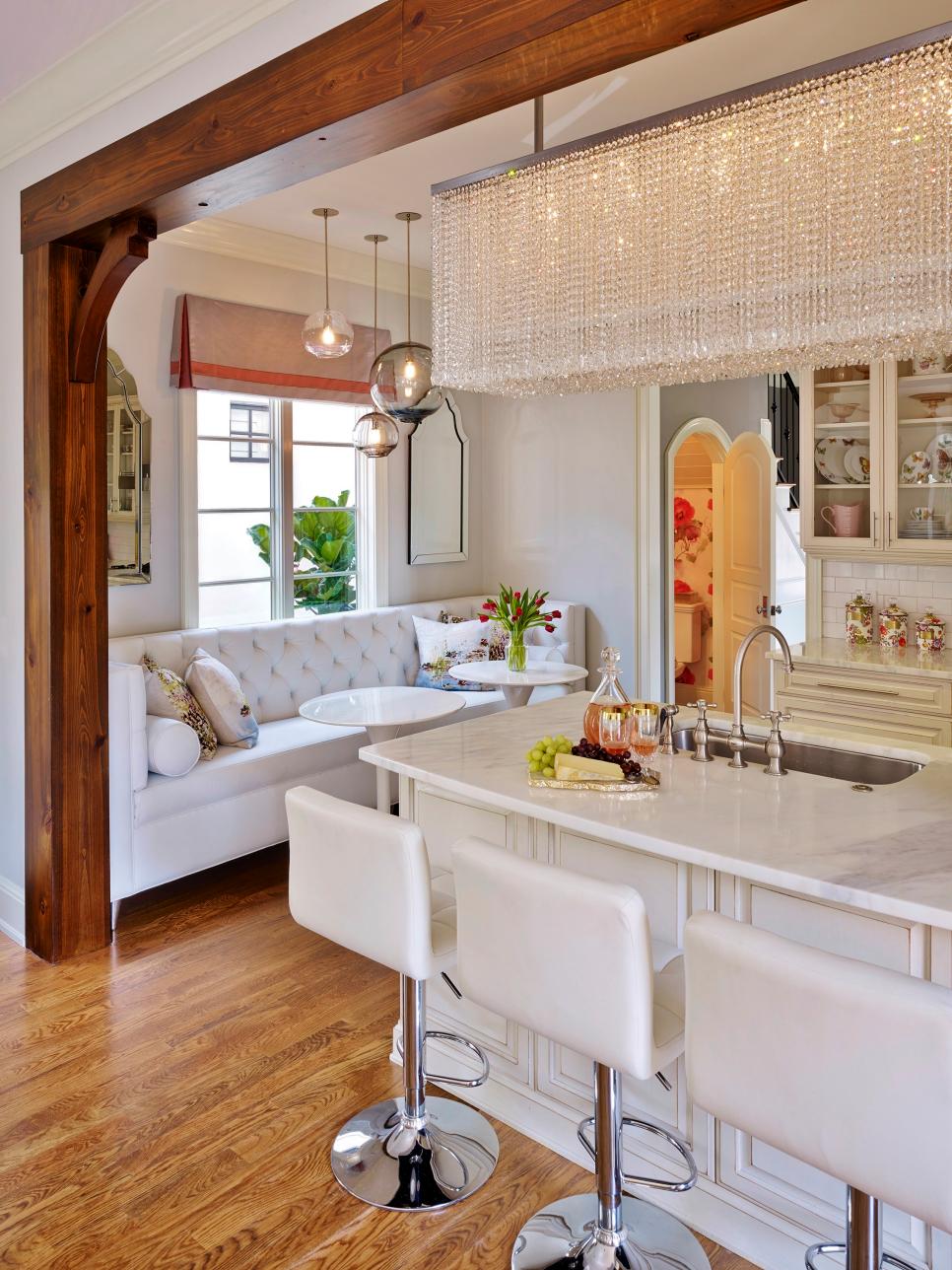 Transitional White Kitchen With Dramatic Chandelier | HGTV