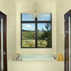 Neutral, Transitional Bathroom With Contemporary Chandelier